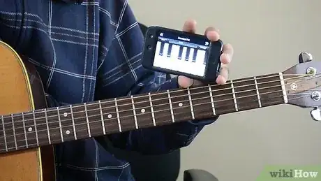 Image titled Tune Your Guitar in Dropped C Step 1