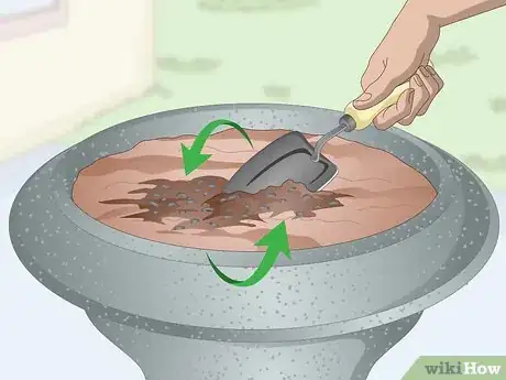 Image titled Plant in Urns Step 5