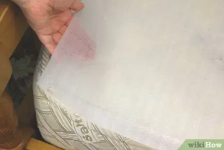 Image titled Use Hardware Store Plastic Sheeting as a Bedwetting Sheet Step 9