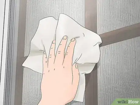 Image titled Hang a Wreath on a Storm Door Step 8