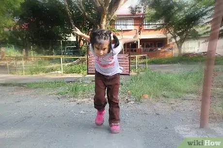 Image titled Jump off a Swing Safely Step 4