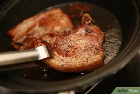 Image titled Tell if Pork Chops Are Done Step 1
