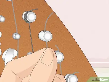 Image titled Change a Harp String Step 8