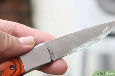 Image titled Loosen up a Stiff Knife Step 6