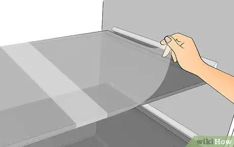 Image titled Cover Refrigerator Shelves in Plastic Wrap Step 9