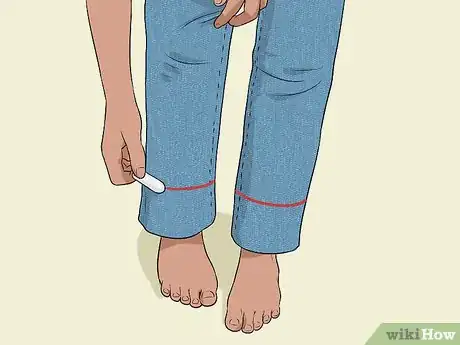 Image titled Hem Jeans with Hot Glue Step 1