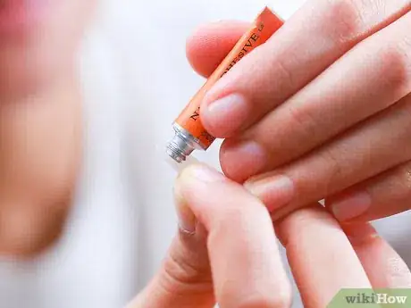 Image titled Make Easy Vampire Fangs Step 7