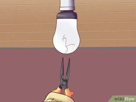 Image titled Remove a Broken Lightbulb from the Socket Step 7