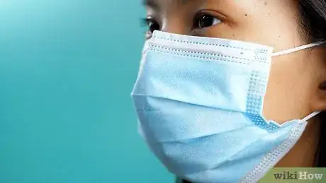 Image titled Properly Take Off a Face Mask Step 2