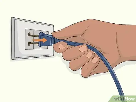 Image titled Adjust Planer Tables Step 1