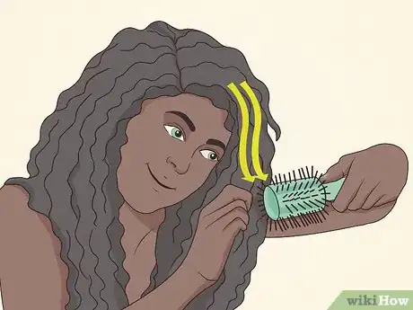 Image titled Put African American Hair in a Bun Step 3