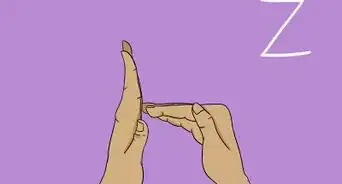 Fingerspell the Alphabet in British Sign Language