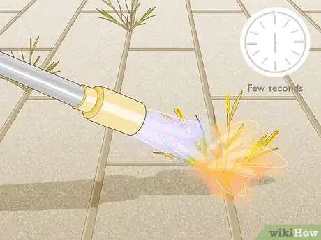 Image titled Burn Weeds in Rocks Step 11
