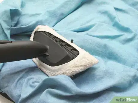 Image titled Get Wrinkles Out of Muslin Backdrops Step 2