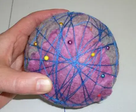 Image titled Begin to wrap string.