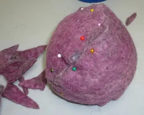 Image titled Pin and trim.