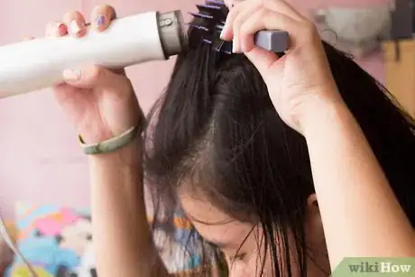 Image titled Straighten Hair with a Roller Brush Step 14