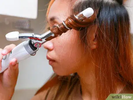 Image titled Curl Your Hair with Tongs Step 11