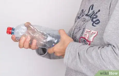 Image titled Make a Water Bottle Cap Pop off with Air Pressure Step 10