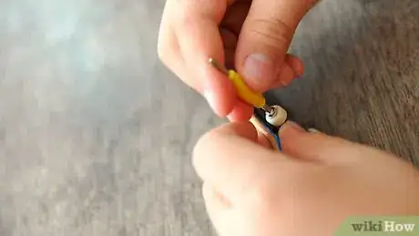 Image titled Tighten Your Wheels and Trucks on a Tech Deck Step 10