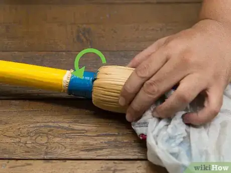 Image titled Make a Puppet with an Empty Bottle and a Broom Stick Step 2