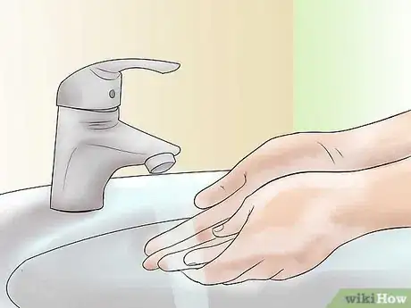 Image titled Take Out a Monroe Piercing Step 1