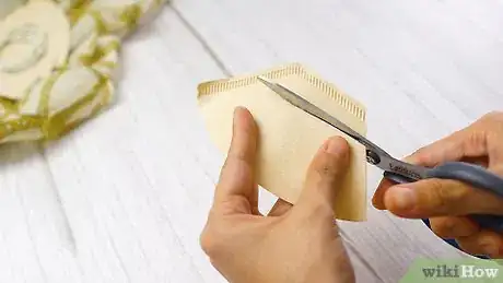 Image titled Cover Your Head and Face with a Scarf Step 1