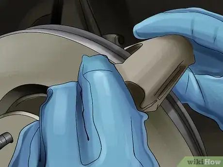 Image titled Install the Front Rotors and Brake Pads on Nissan Sentra 2.0L SR 2010 Step 11