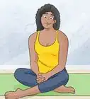 Do Savasana (Corpse Pose)