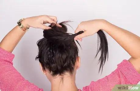 Image titled Put Frizzy Hair Into a Bun Step 4