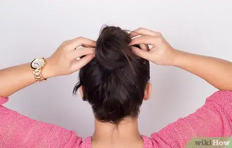 Image titled Put Frizzy Hair Into a Bun Step 5