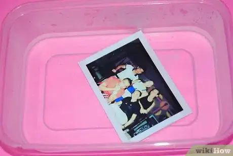 Image titled Soak the taped image to warm water Step 4