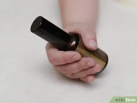 Image titled Use Jojoba Oil to Enhance Dry Hair Step 1