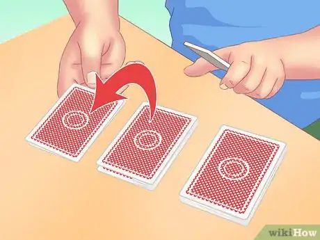 Image titled Make a Card Fall Through a Table Step 7