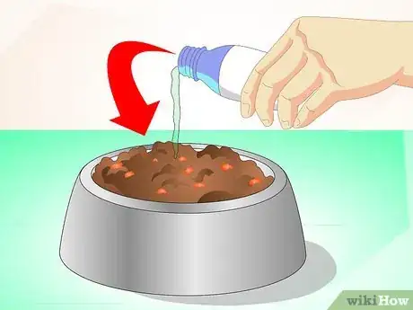 Image titled Deliver Oral Medication to Cats Step 2