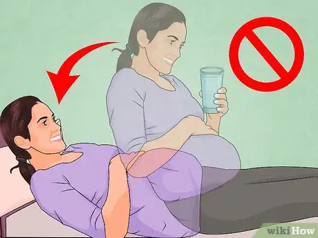 Image titled Lie Down in Bed During Pregnancy Step 2