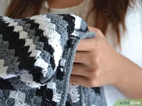 Image titled Care for 10 or More Stuffed Animals Step 9