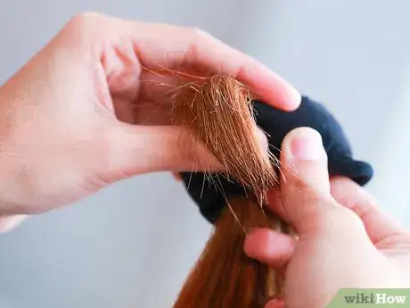 Image titled Get Wavy Hair Overnight with a Bun Step 6