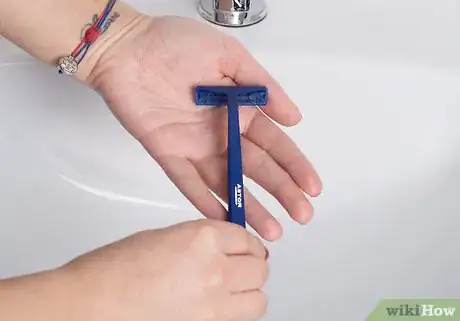 Image titled Shave Using Only a Razor and Water Step 1