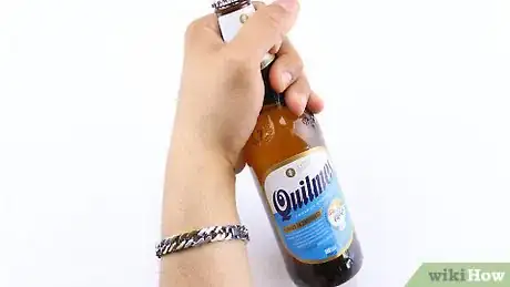 Image titled Open a Beer Bottle with a Key Step 1