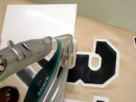 Image titled Paper and iron in position