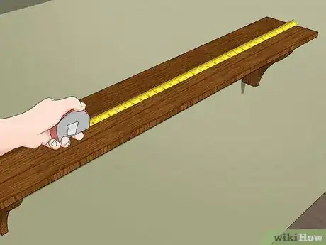 Image titled Decorate Shelves in a Bedroom Step 3