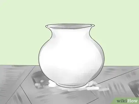 Image titled Create a Raised M‐Seal Design for a Painted Terracotta Pot Step 3