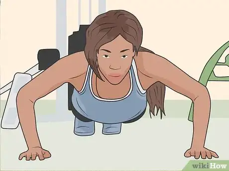 Image titled Build Your Arms and Chest Without Bench Presses Step 01