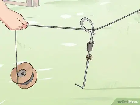 Image titled Install and Use a Temporary Electric Fence for Cattle Step 5