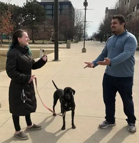 Image titled Outside photo of people meeting a dog 5