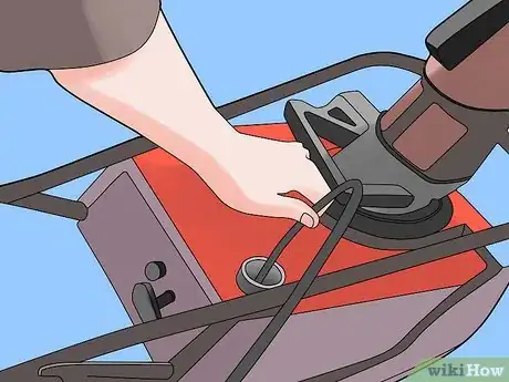 Image titled Start a Sputtering Snowblower Engine Step 1