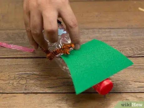 Image titled Make a Puppet with an Empty Bottle and a Broom Stick Step 9