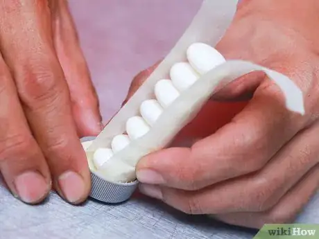 Image titled Make a Diet Coke and Mentos Rocket Step 14