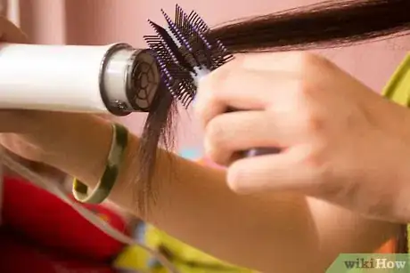Image titled Straighten Hair with a Roller Brush Step 12